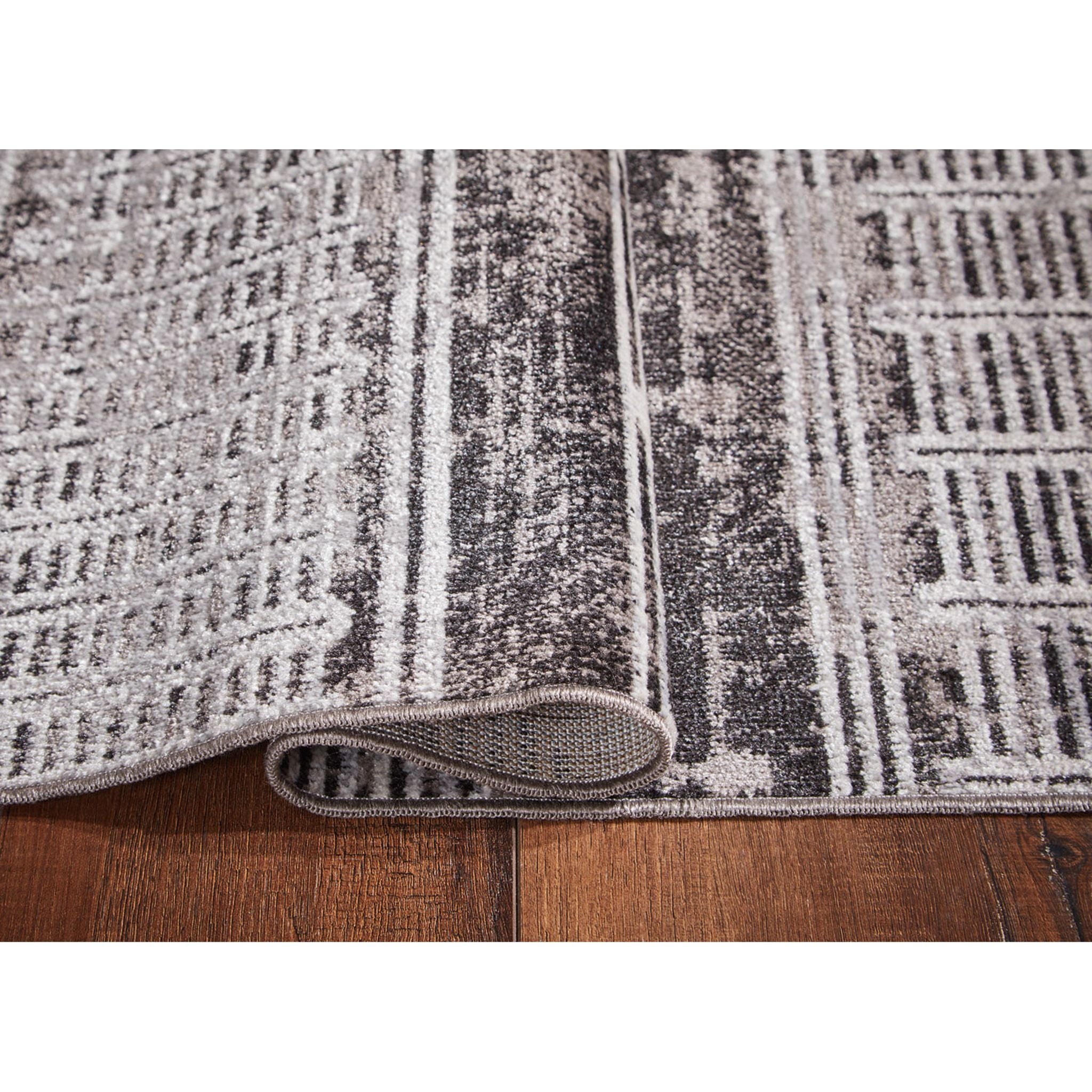 Henchester Area Rug - 5'x7'